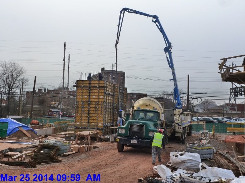 Pouring concrete at Elev. 1,2,3 Shear wall Facing South-East